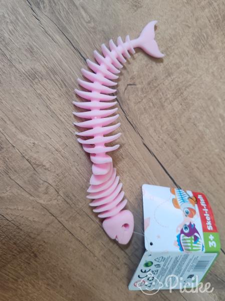 Új, címkés rózsaszínű Skel-i-fish játék