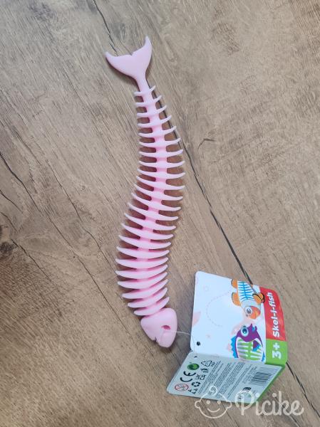 Új, címkés rózsaszínű Skel-i-fish játék